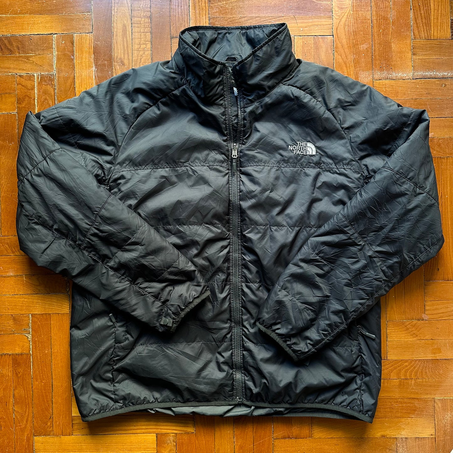 The North Face Men’s Black Light Puffer Jacket